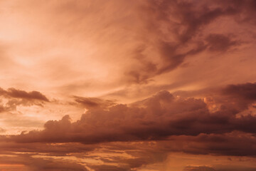 Wall Mural - beautiful sky with orange clouds in sky at sunset . natural background.