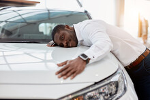 Happy Black Businessman Hug His New White Luxurious Car In Dealership, He Made Successful Purchase.