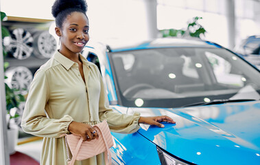 Wall Mural - happy young black woman in dealership, beautiful lady came to buy automobile,she liked one of cars represented in dealership