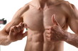 © H_Ko - Athlete bodybuilder takes dope in the form of tablets form of pharma rapid progress in muscle development