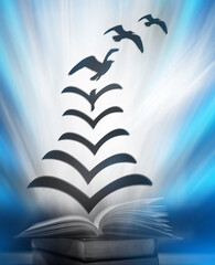 Poster - a fantasy abstract image opens the book where the paper floats out of the book, turning into a bird 