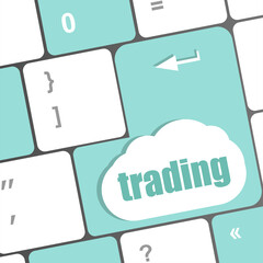 Poster - business concept. Button on Modern Computer Keyboard with Word trading
