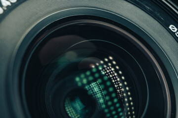 Poster - Close up beautiful camera aperture lens with multi colored light glass reflection. Macro view.