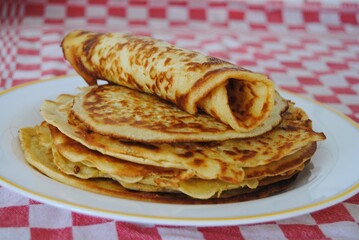 Poster - Closeup shot of freshly-baked pancakes in a plate