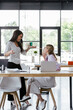 © LIGHTFIELD STUDIOS - displeased businesswomen gesturing and quarreling in office