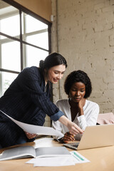 Wall Mural - Confident smart women entrepreneurs working