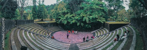 Fotomural High Angle View Of People In Amphitheater Against Trees