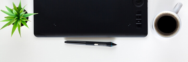 Fototapete - Graphic tablet on a white empty background. Copy space. Computer graphics desk. Panorama