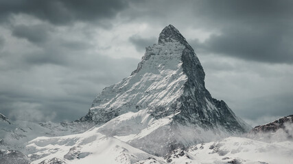 Leinwandbilder - view to the majestic Matterhorn mountain in front of cloudy sky