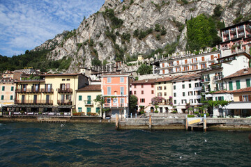 Lake Garda, in northern Italy surrounded by hills and villages with boats in the water