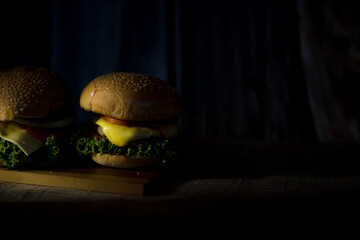 Home made hamburger with fresh vegetables lettuce and cheese 