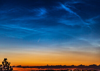 Wall Mural - comet neowise and noctilucent clouds in the early morning over great falls montana