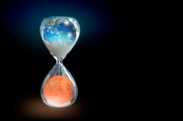 Poster - Global warming concept - Planet Earth is becoming a dead planet like Mars - Hourglass inside Planet Earth and Mars isolated on black background 