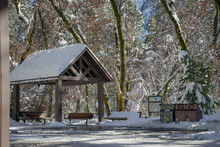 Wooden Arbor Or Wooden Cabin At Yosemite Central Park In Snow Winter