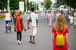 © Lensplayer - Black girl with dreadlocks walks in the park with a guy
