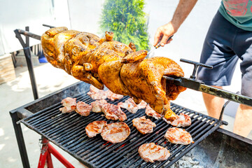 chicken and  pork chops on the grill