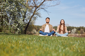 Wall Mural - Smiling young man and woman resting outdoors