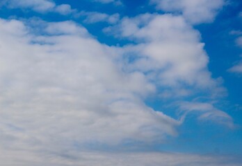 The white cloudscape in the blue sky.