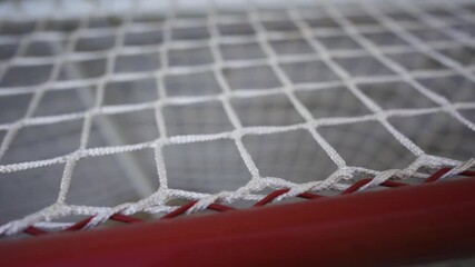 Closeup Of Ice Hockey Goal, Crossbar And Mesh Netting