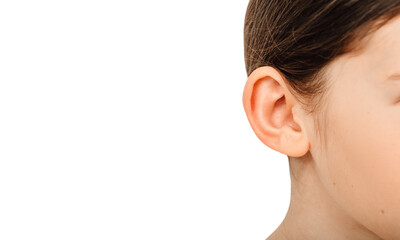 Child ear close-up isolated on a white background. Treatment and hearing test, hearing exam concept