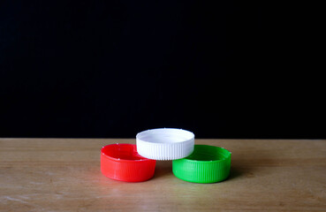 close up of plastic bottle caps.