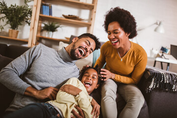 African american family spending time together at home. They are having fun