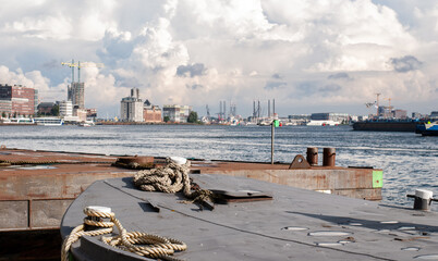 City panorama and mooring ropes in Amsterdam, Netherlands