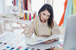 © P Stock - Designer are thinking and designing clothes for customers order items.