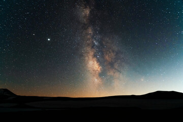 Wall Mural - beautiful starry sky with mountais silhouete, milky way galaxy. night landscape. astronomical backgr