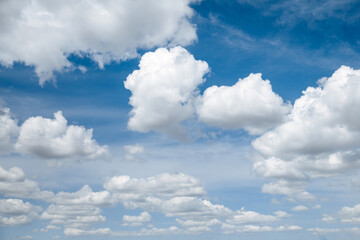 Wall Mural - blue clear sky with white fluffy clouds. natural background
