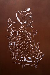 Wall Mural - Cartoon figures carved on steel plates