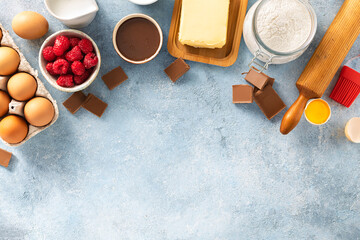 Poster - Ingredients for cooking raspberries and chocolate pie with copy space top view Bakery background