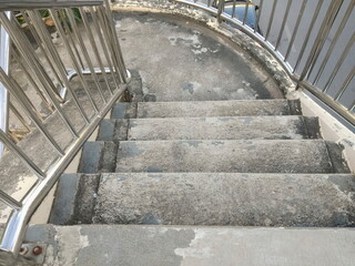 view of cement down stair not support wheelchair.