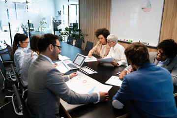 Group of multiethnic business people working at busy modern office