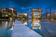 canvas print picture - Reflection Of Illuminated Buildings In Swimming Pool Against Sky, Hq Thyssen,  Essen