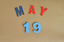 May 19, Toy Alphabet With A Brown Background.
