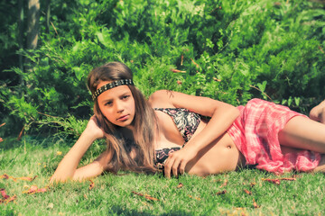 portrait of beautiful cute brunette teenager model with makeup, poreo, in summer colorful swimsuit p