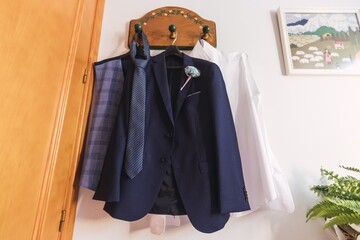 Canvas Print - Close up shot of a wedding suit with a boutonniere