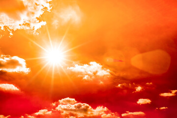 hot summer or heat wave background, orange sky with burning sun
