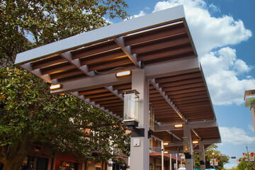 Beautiful overhead trellis with lights of flames on each post