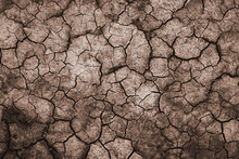 Dry And Cracked Soil Ground During Drought, Viewed From Above