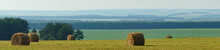 Hay Bales In The Field. Panorama
