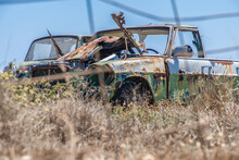 Abandoned Cars On Field