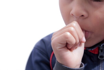 Wall Mural - little boy sucking thumb on white background stock photo