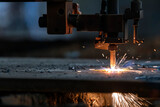 Fototapeta  - CNC Plasma cutting. It is a process that cuts through electrically conductive materials by means of an accelerated jet of hot plasma.