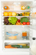 Inside fridge full of vegetables