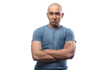 Wall Mural - Photo of young bald sorry man in blue tee shirt