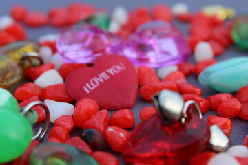 Wall Mural - I Love You written beautiful gift background on colorful display, selective focus.