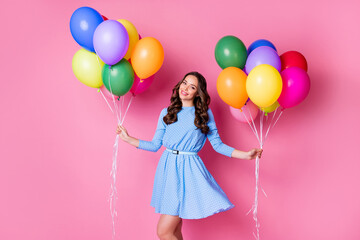 Poster - Portrait of her she attractive stunning cheerful cheery glad wavy-haired lady holding in hand bunch air balls corporate event delivery deliver order courier isolated pink pastel color background