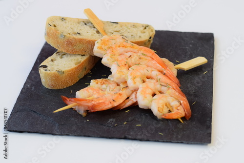 Cuadros en Lienzo Pincho de langostino a la plancha